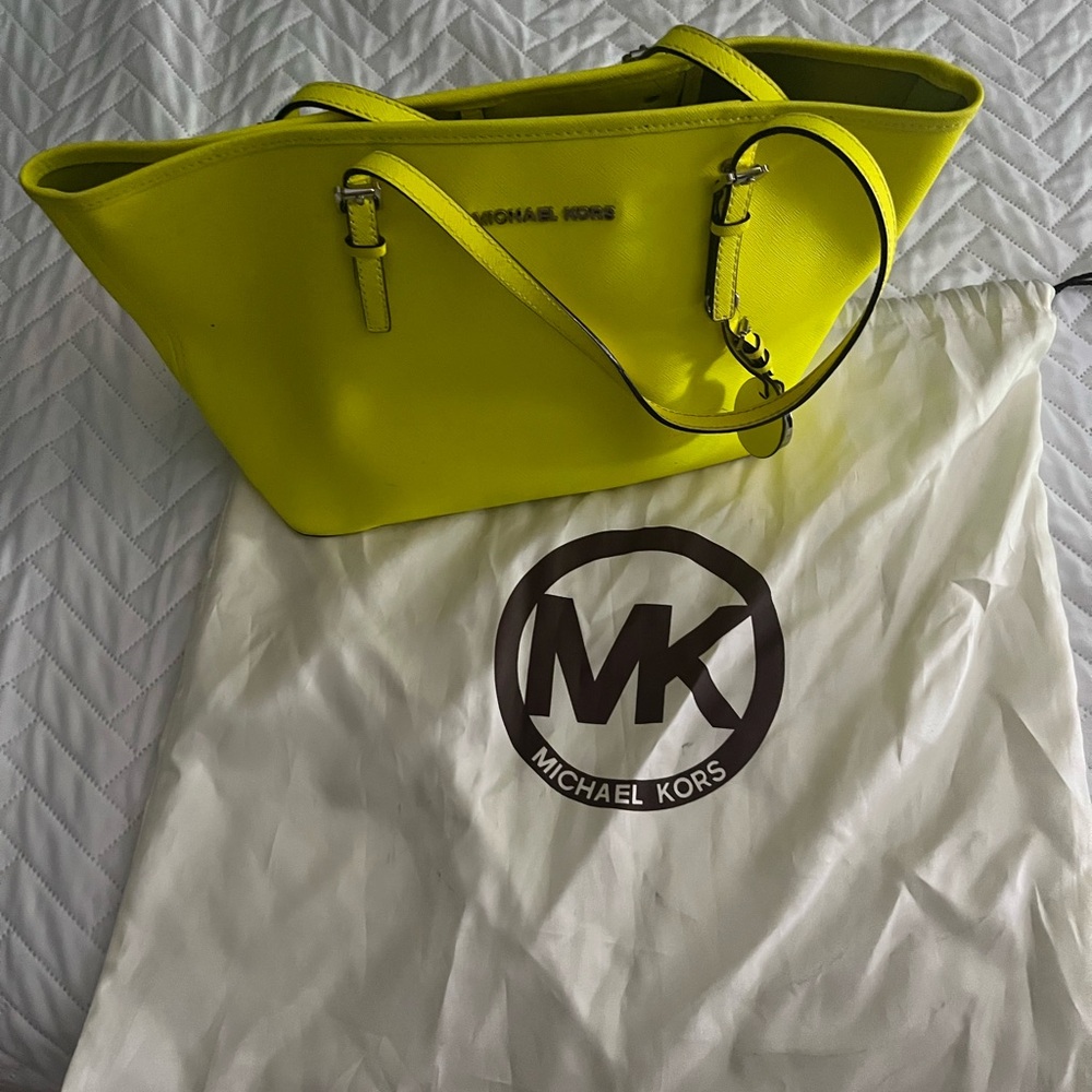 Neon green-yellow Michael Kors bag in outstanding used condition